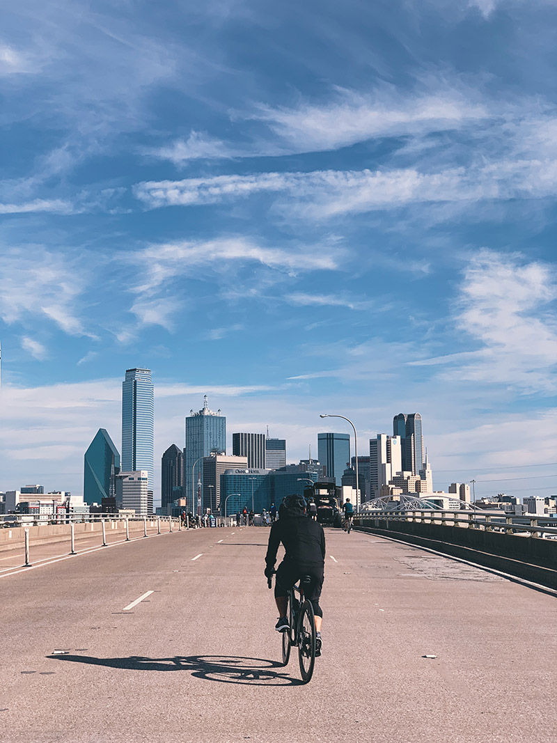 Bike rider approaching city